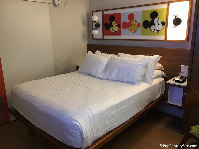 Queen size bed in renovated rooms