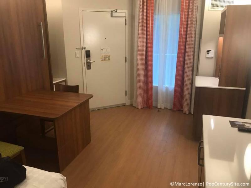 Hardwood floors replace the carpet in updated rooms